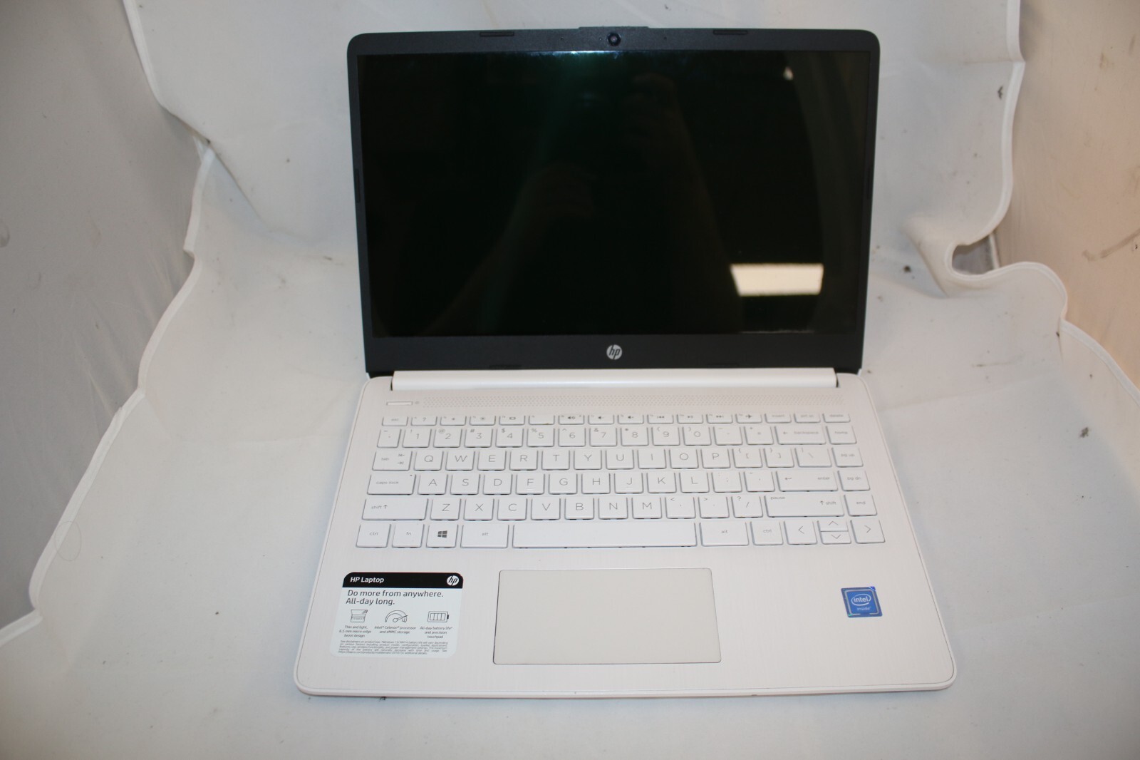 HP Laptop (snowflake) w/ charger (64 gb hard drive, 4 gb ram) 14-DQ0002DX