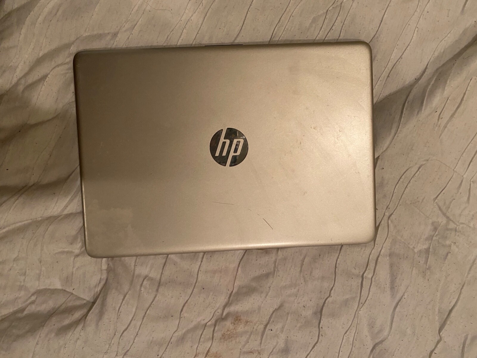 Gently used HP 14″ Laptop in Pale Gold
