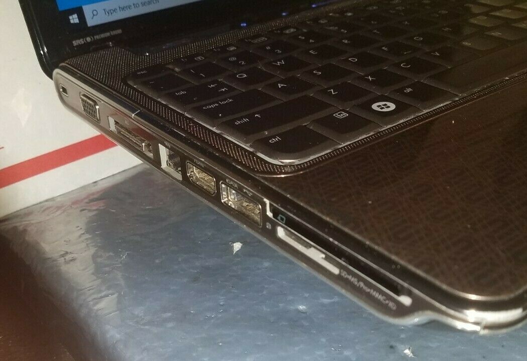 HP Pavilion dv4-1220us 14.1”(AMD Dual-Core @ 2.1GHz,4GB Ram,250GB HDD)Win 10