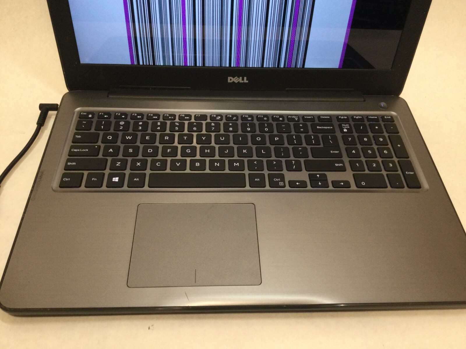 Dell Inspiron 5565 15.6” / UNKNOWN SPECIFICATIONS / (CRACKED/MISSING PARTS!) -MR