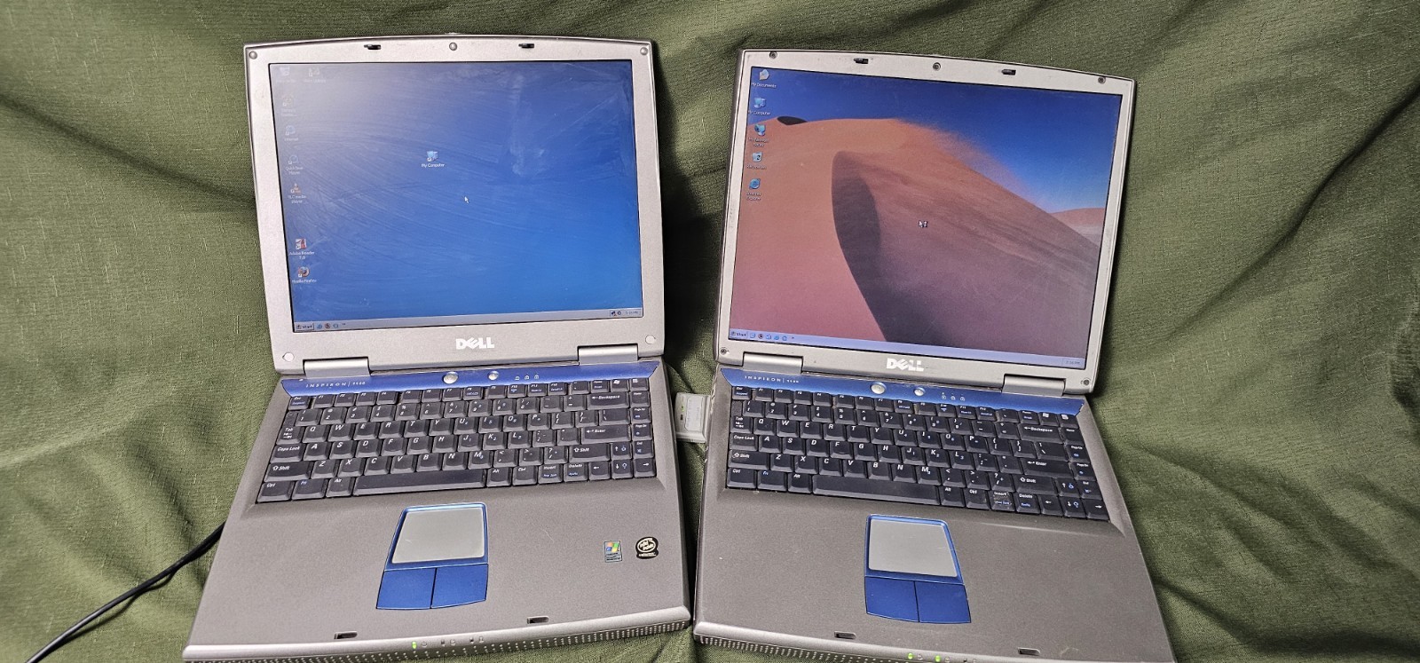 (2) DELL Inspiron 1100 Laptops 1 good battery, no hard drive, both work lot of 2