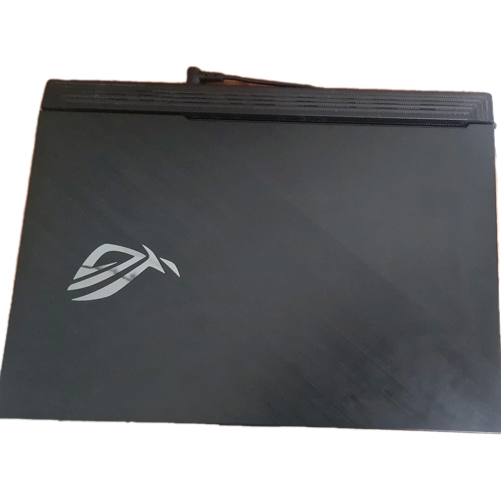 ASUS ROG Strix G G731GU And Nintendo Switch with joycons and one controller