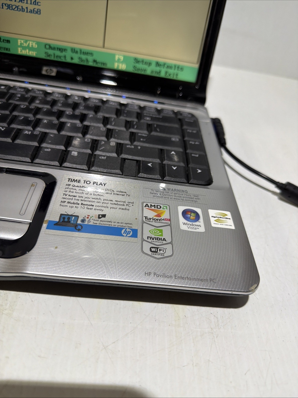 Hp Pavilion dv2700 14″ Laptop AMD Turion 64 X2 2gb Ram NO Drives Boots Bios