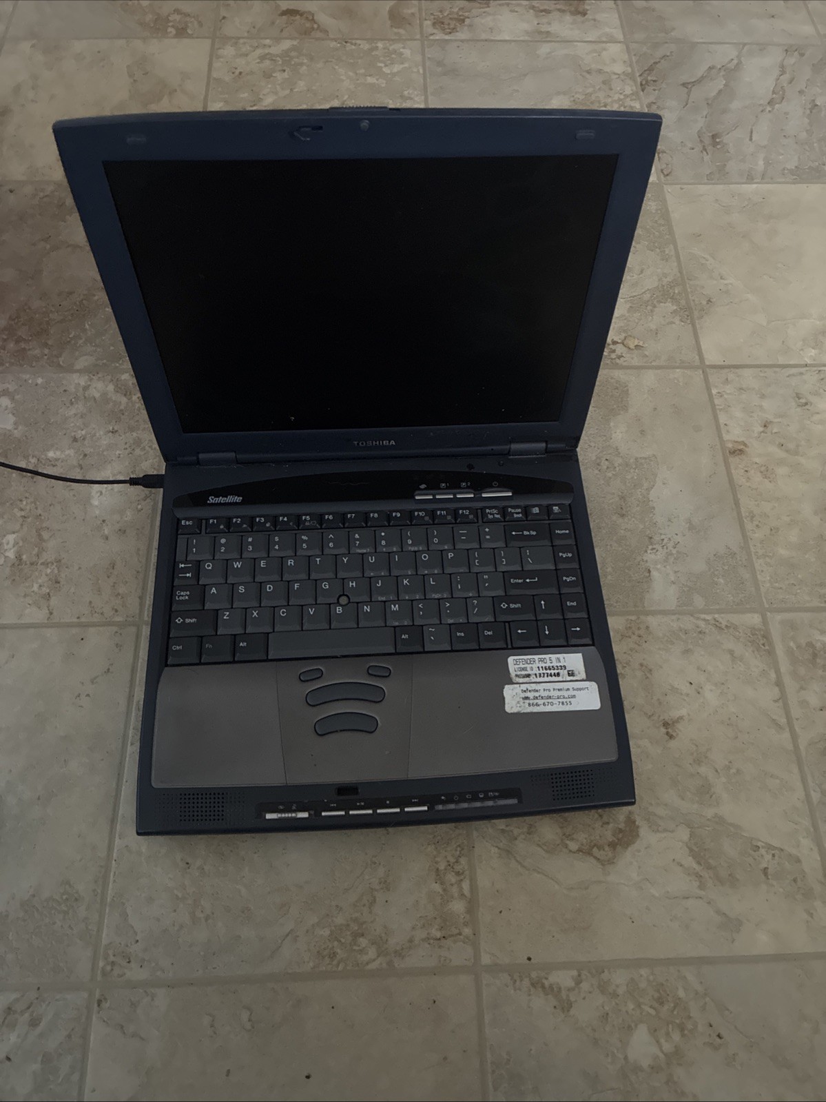 Toshiba Satellite from the 2000s, does NOT turn on, comes with charger