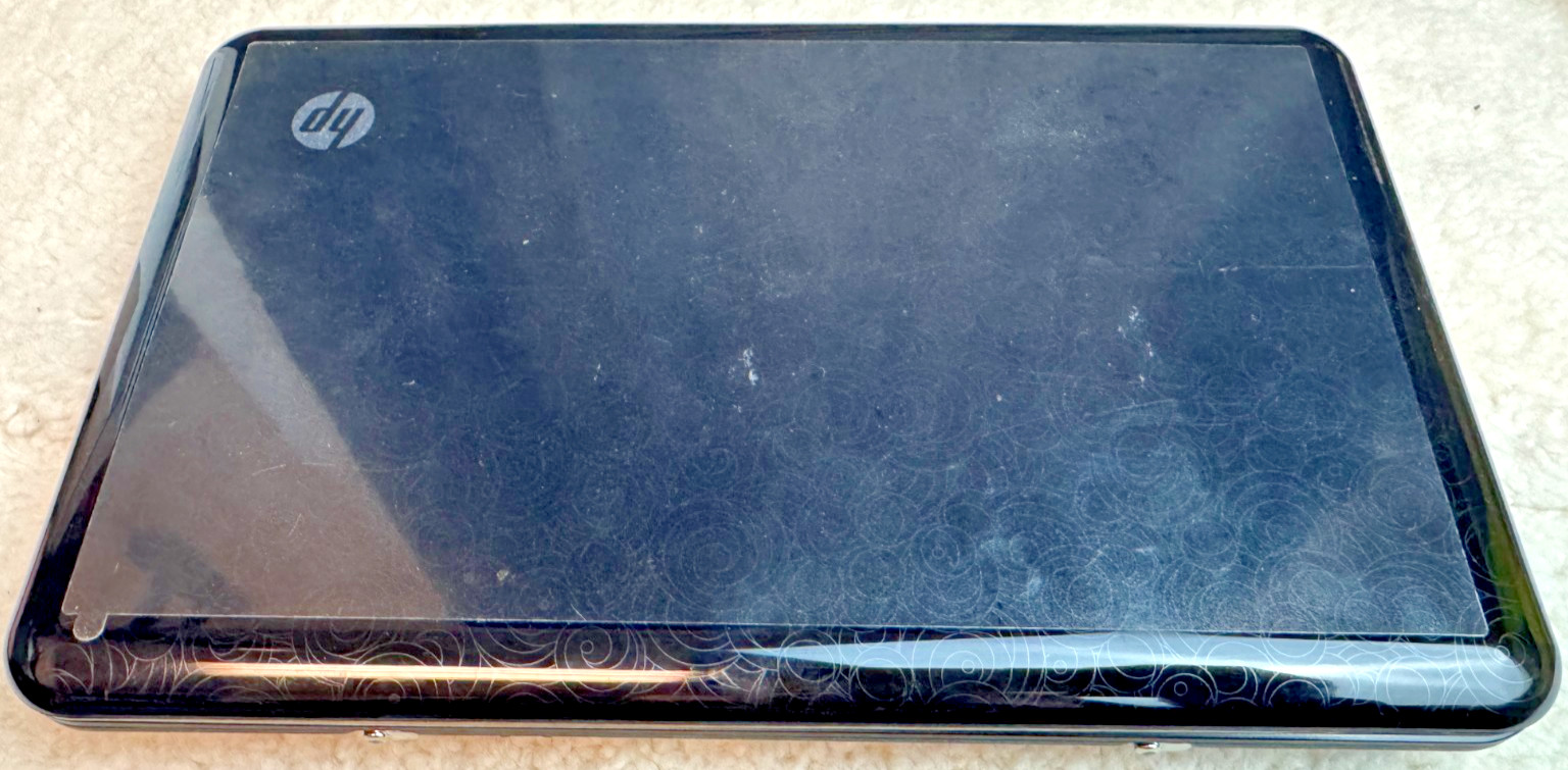 Pre-owned HP Mini netbook in working condition, powers on and boots to Windows X