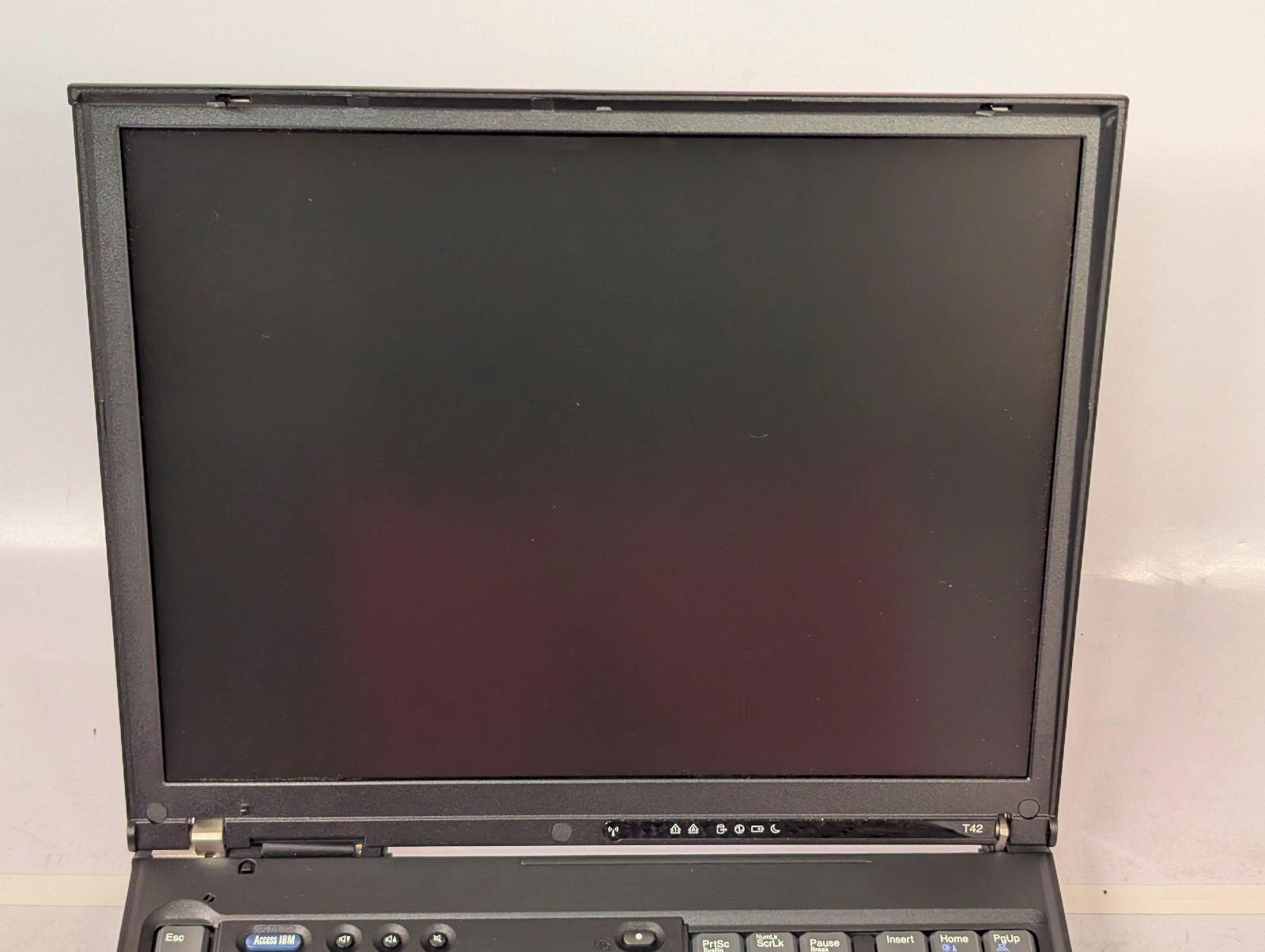 IBM ThinkPad T42 laptop; for parts or repair; 4 beeps 4 times; not powering on