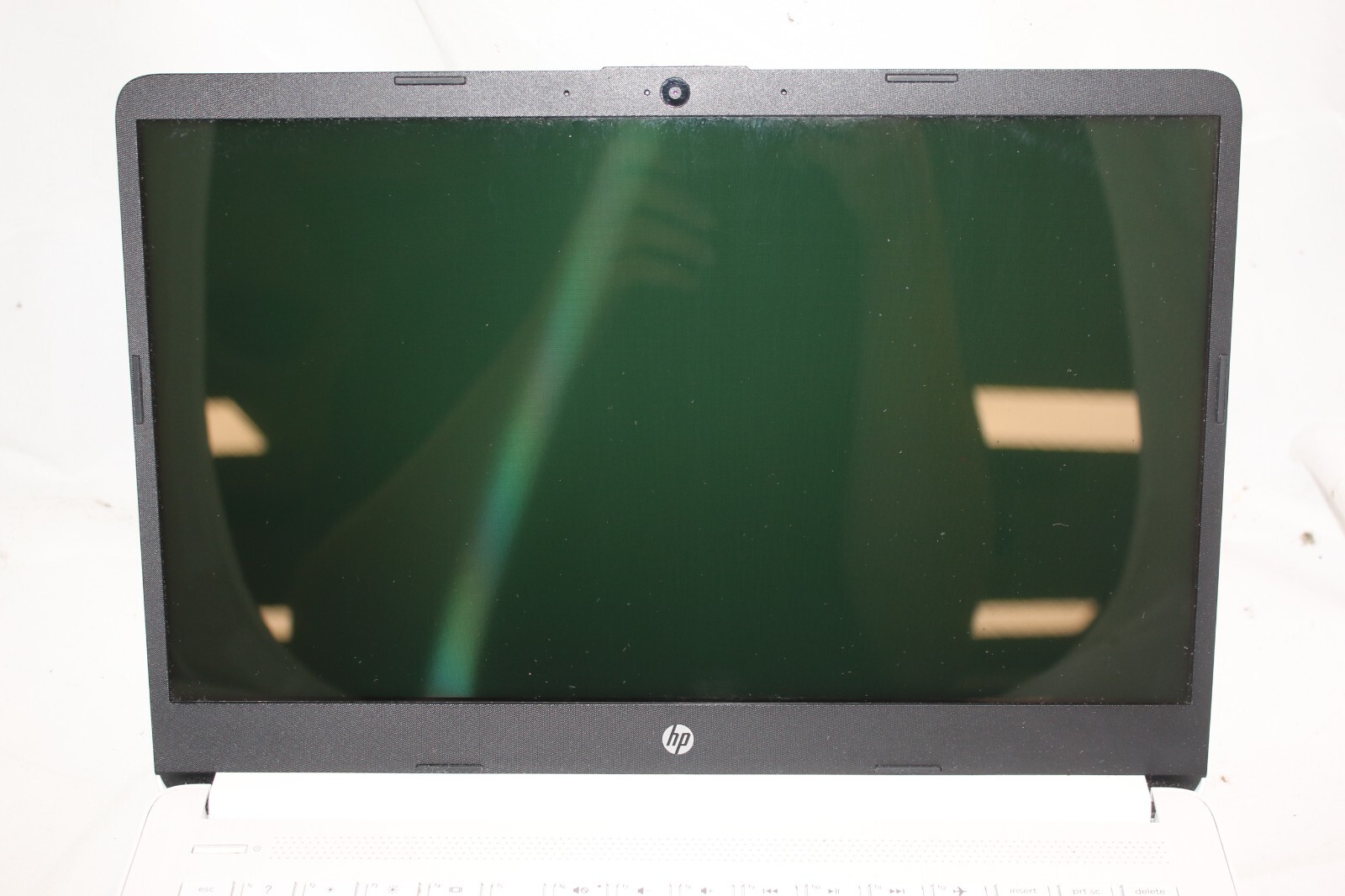 HP Laptop (snowflake) w/ charger (64 gb hard drive, 4 gb ram) 14-DQ0002DX