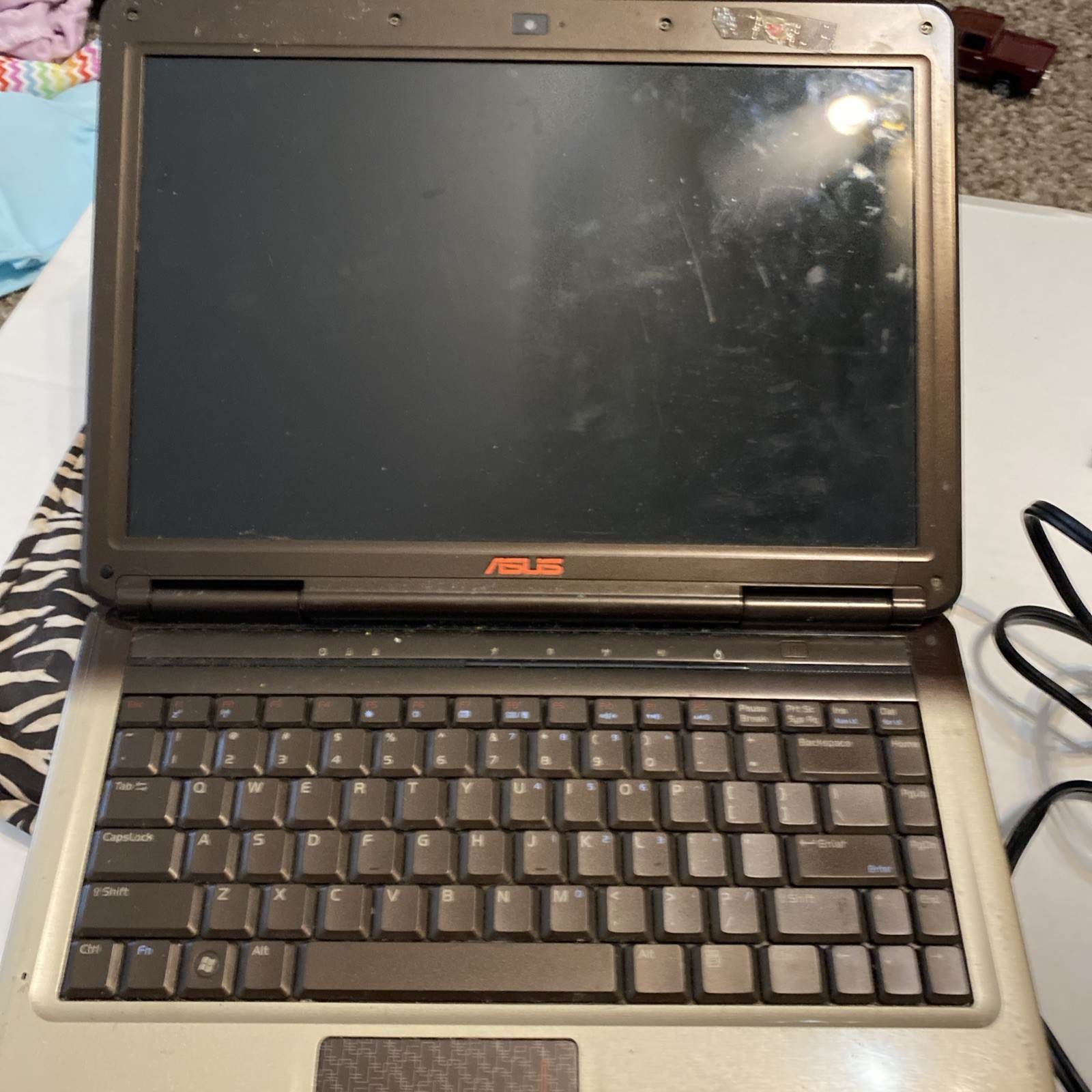 Asus X83Vb-X2 14.1″ Intel Centrino Laptop Unknown Specs Unit For Parts/Repair