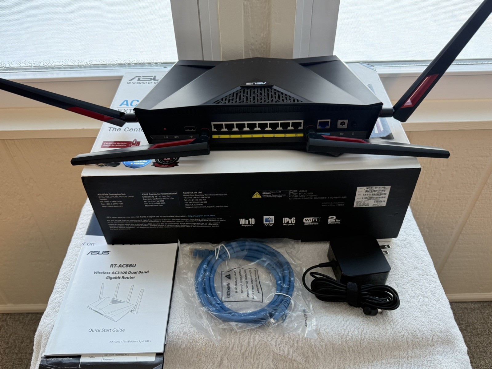 Asus RT-AC 88U WiFi Router/ Asus RP-AC 1900 WiFi Range Expander/ Motorola Modem