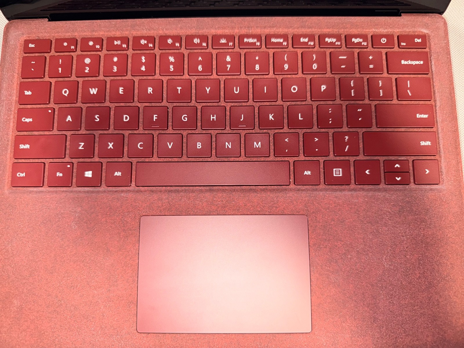 Windows10 Pro 13in. Burgundy Microsoft Surface laptop perfect condition.