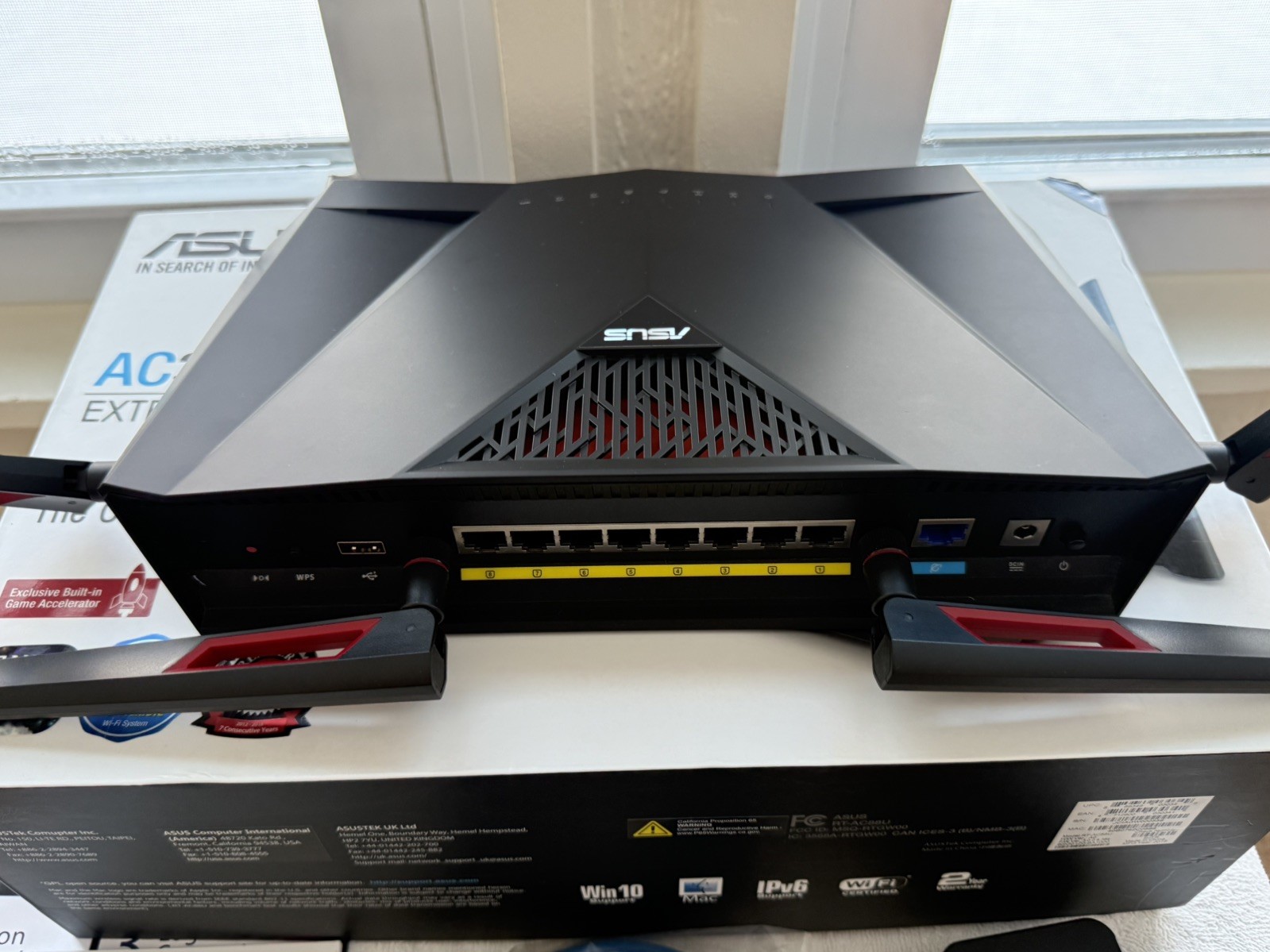 Asus RT-AC 88U WiFi Router/ Asus RP-AC 1900 WiFi Range Expander/ Motorola Modem