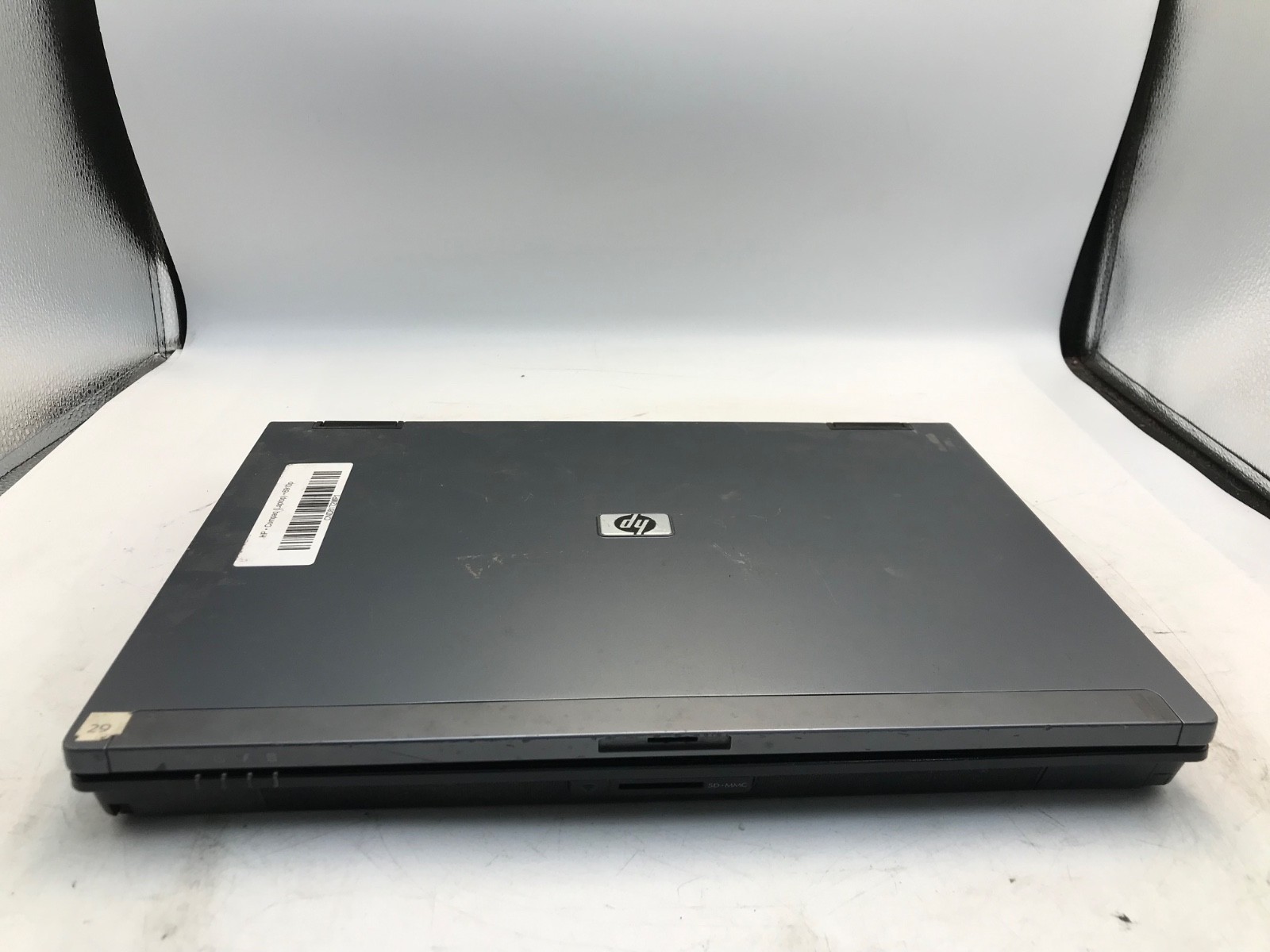 HP Compaq 6910p Intel Core 2 Duo 2.1GHz 14″ NO HDD-BOOTS BIOS, BAD LATCH-MZ