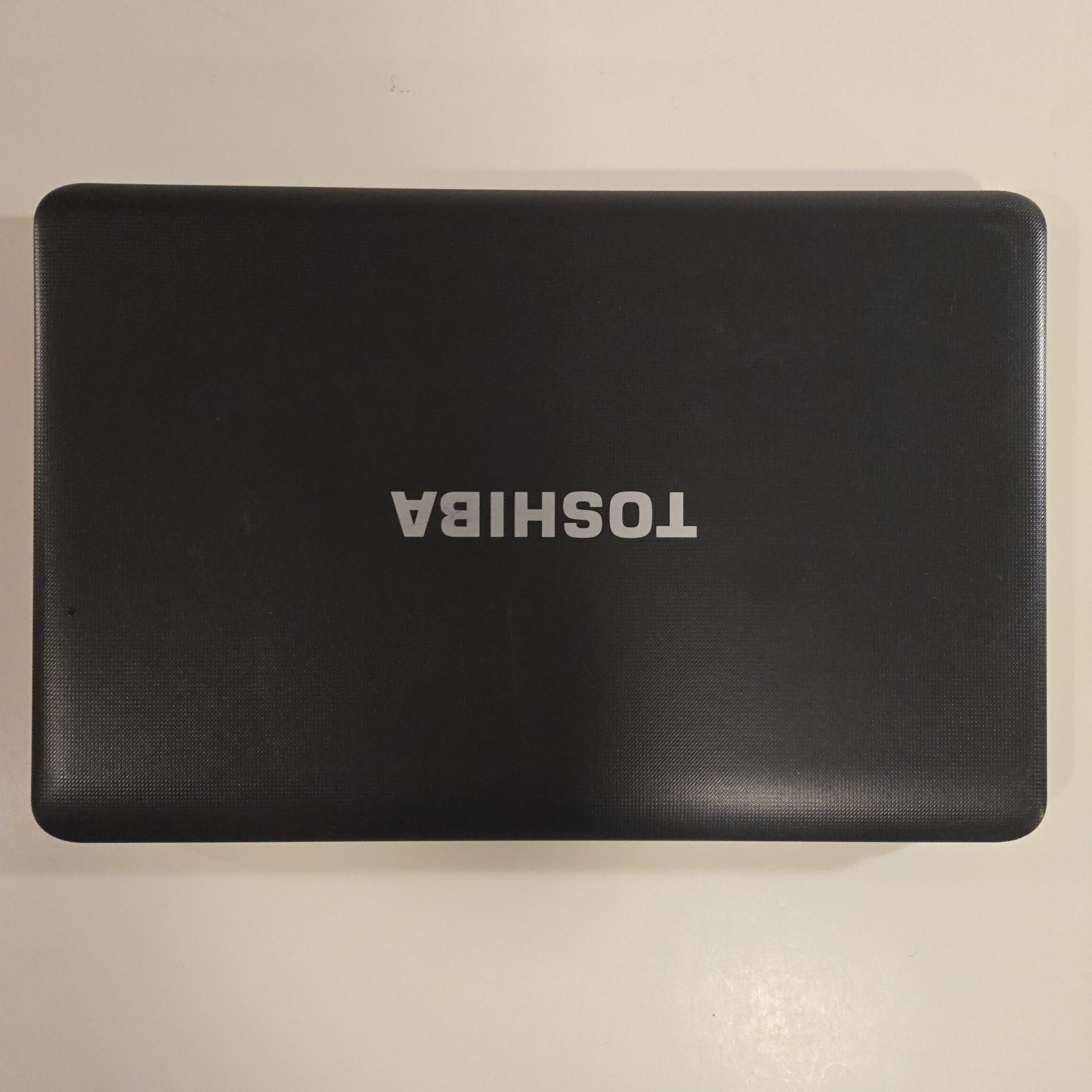 Toshiba Satellite C655D 15″ Laptop AMD C60 NO HDD/Battery/RAM/Power Cable WYSIWG