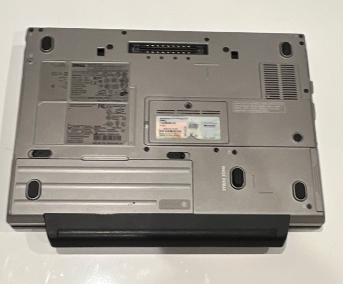 Dell Latitude D620 Laptop with docking station and original papers ‘still runs’