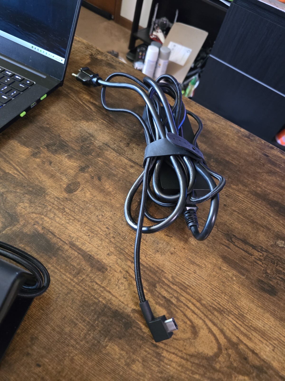 black Razer 14″ Gaming Laptop with razer rgb laptop stand and power supply unit