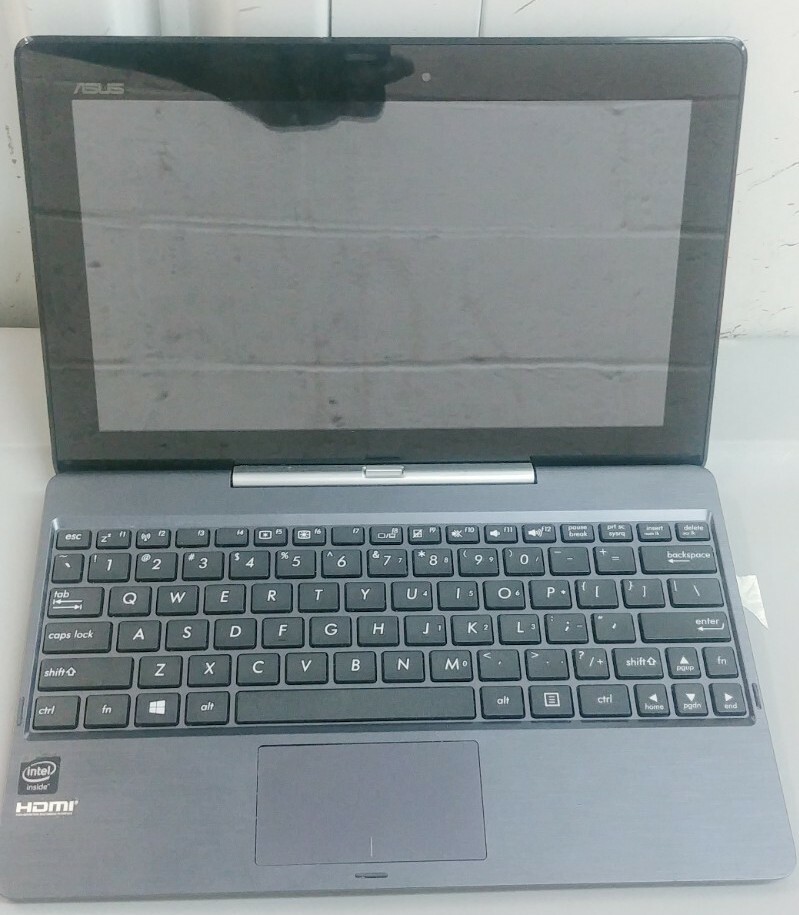Asus T100 Transformer Book Intel Atom 1.33GHz 2GB 64GB HDD Win 10 with adapter