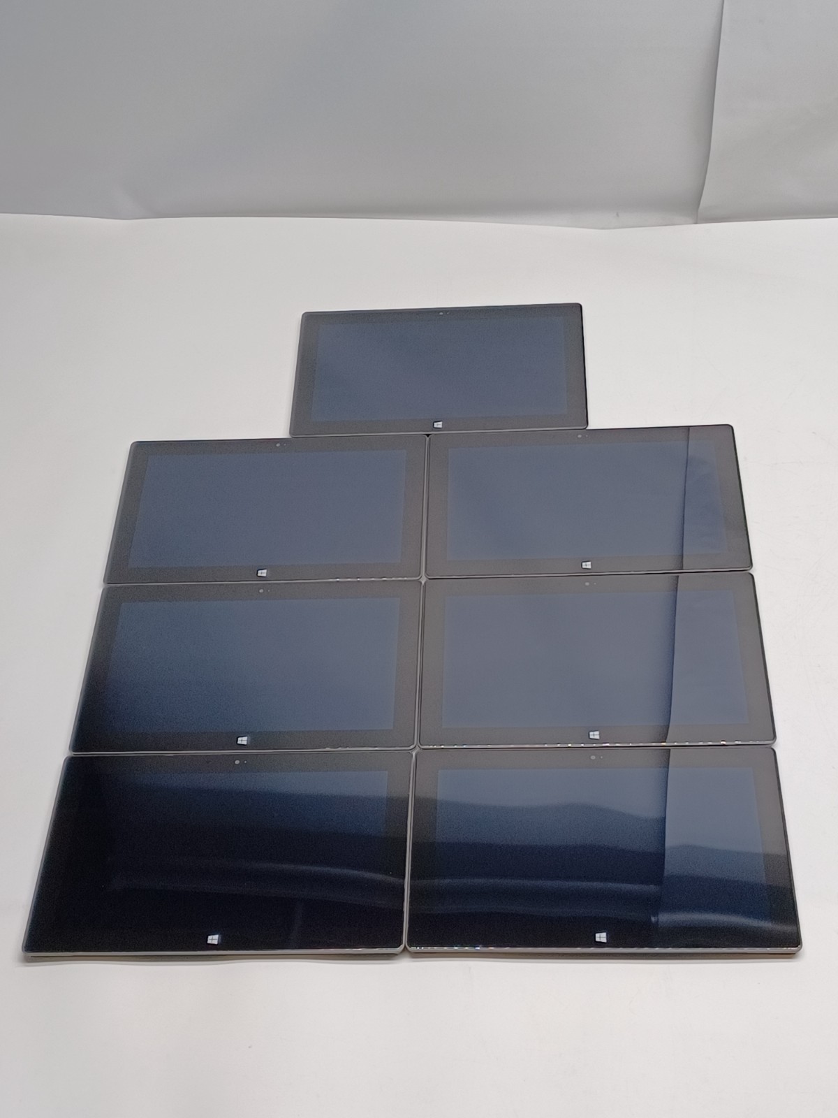 Lot of 7 damaged Microsoft Surface RT 1516 Tablets for parts/ repair
