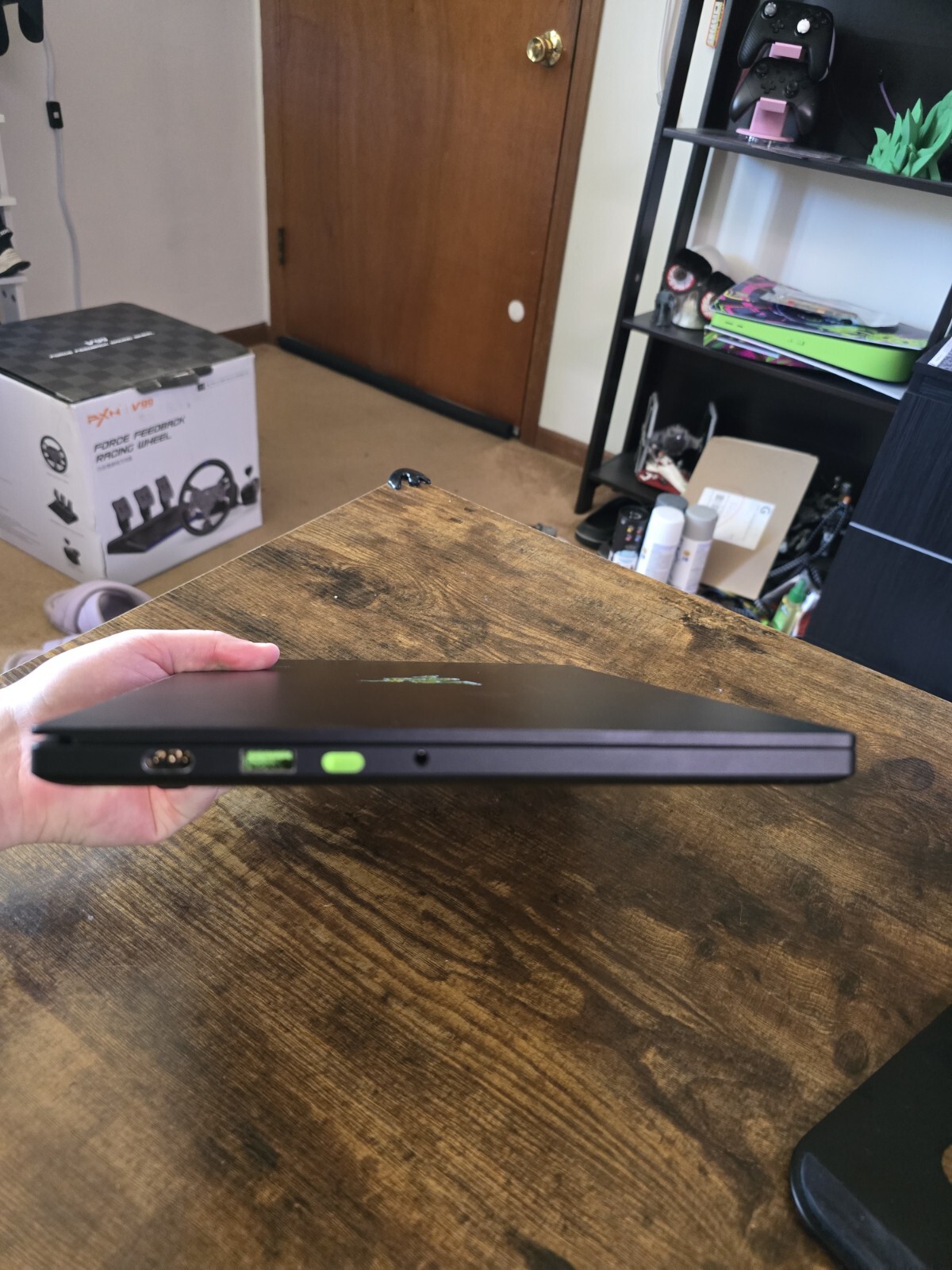 black Razer 14″ Gaming Laptop with razer rgb laptop stand and power supply unit