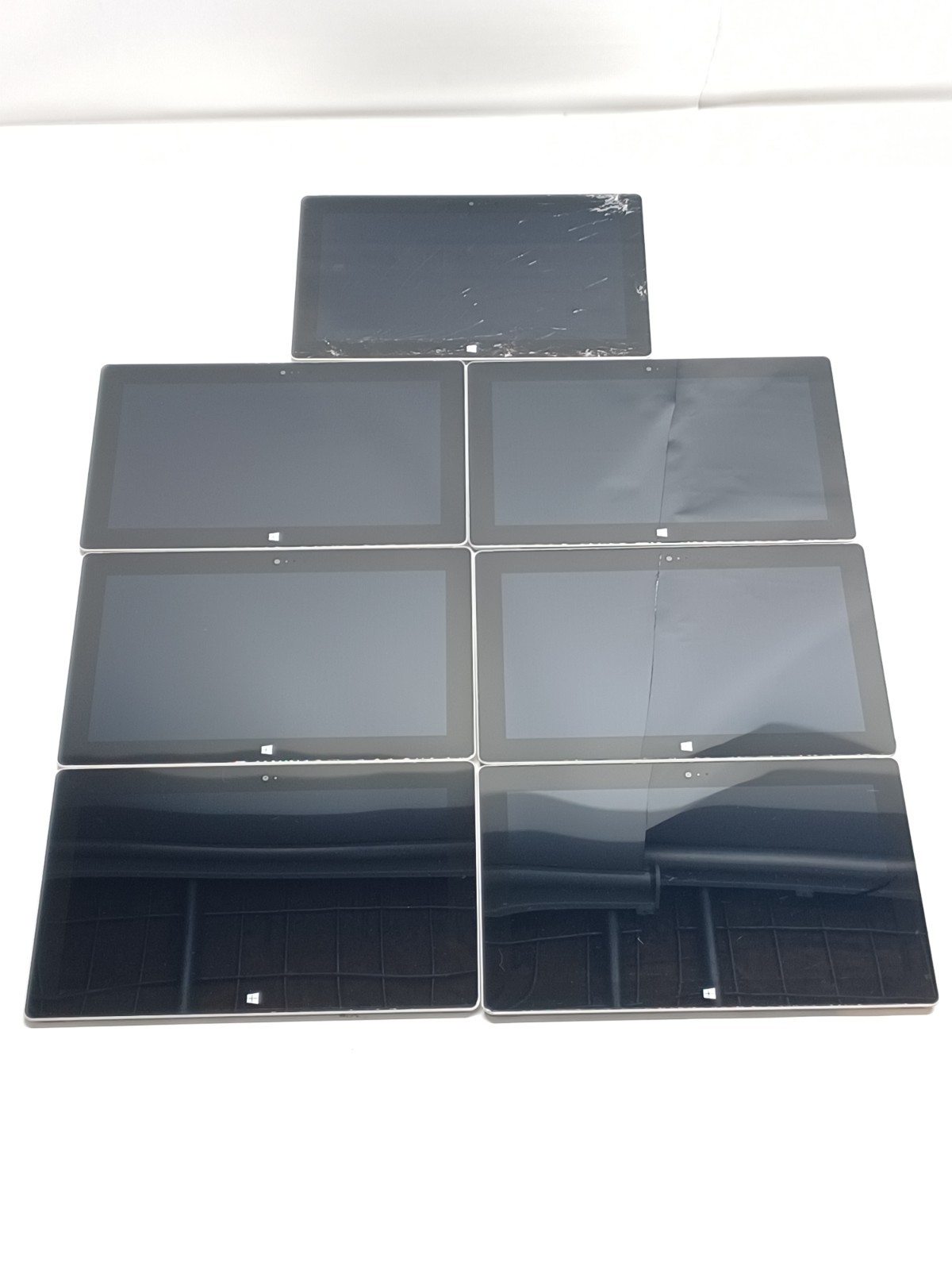 Lot of 7 damaged Microsoft Surface RT 1572 Tablets for parts/ repair