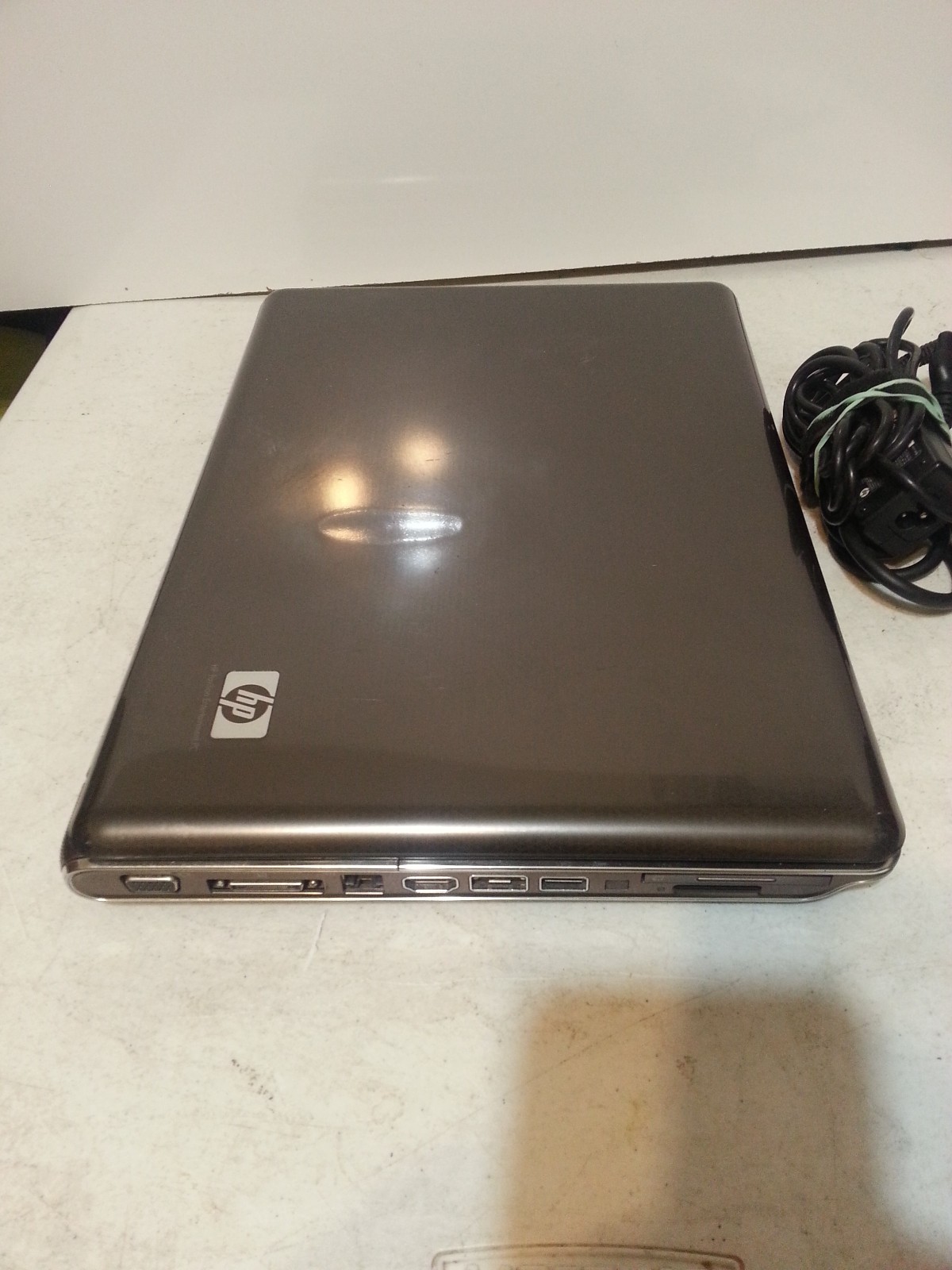 HP DV5 1235DX 15″ Laptop Intel 2GH, 4Ram, 250HDD, Windows 10 PRO