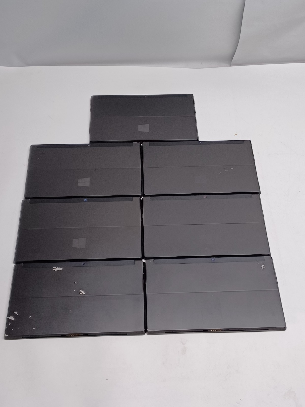 Lot of 7 damaged Microsoft Surface RT 1516 Tablets for parts/ repair