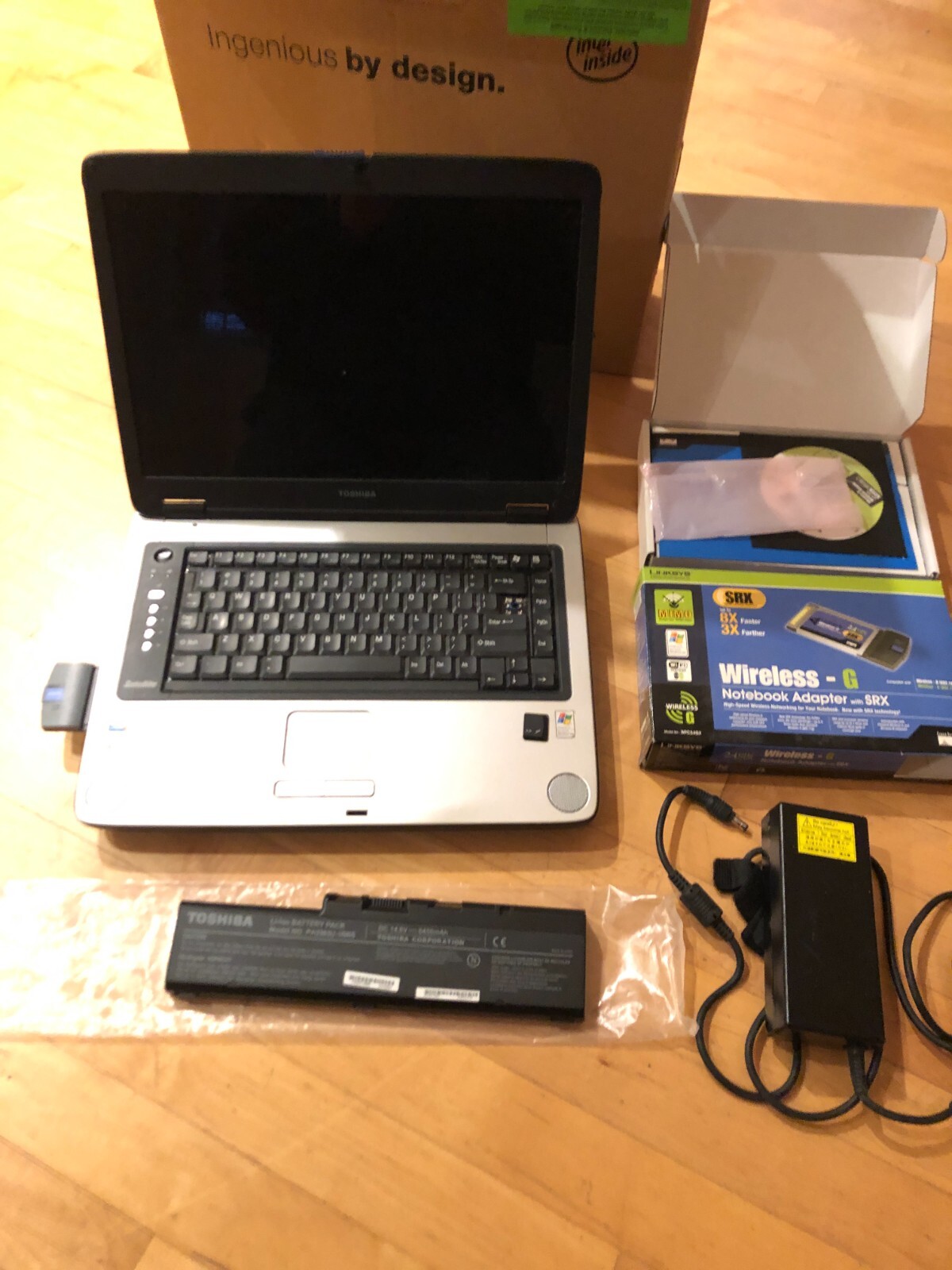 Toshiba Satellite A75-S125 laptop with Cisco-Linksys SRX400 wireless-G adapter