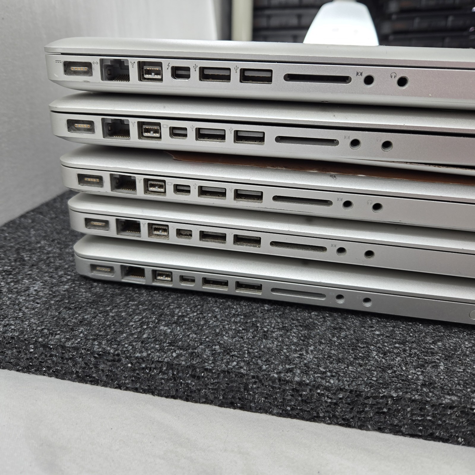 Lot of (5) Apple MacBook Pro A1286 intel i5 – Mixed condition — PARTS
