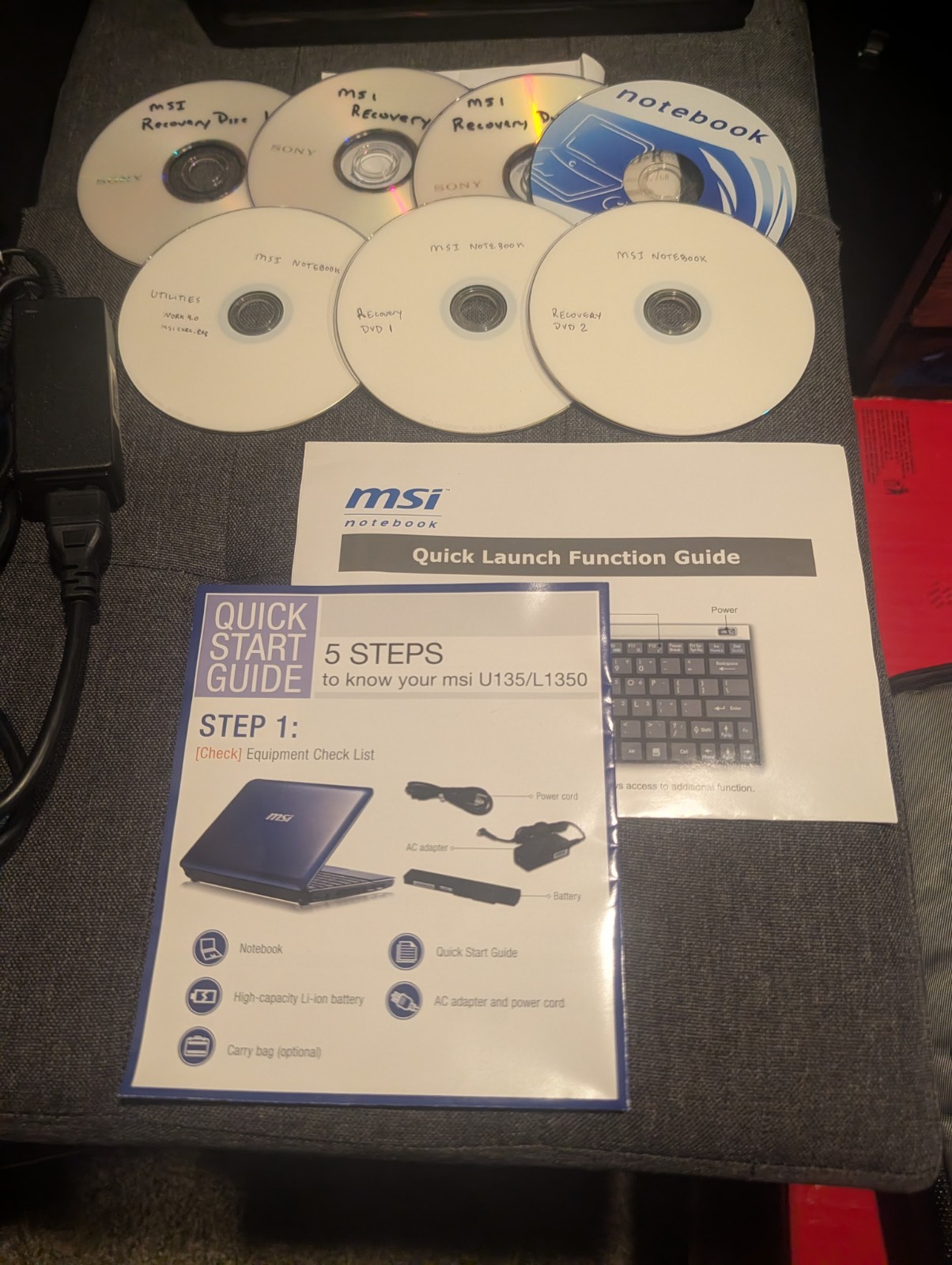 MSI L1350 N014 Intel Atom N455 10″ Laptop W/ Bag, Disks, Booklets & Charger Cord