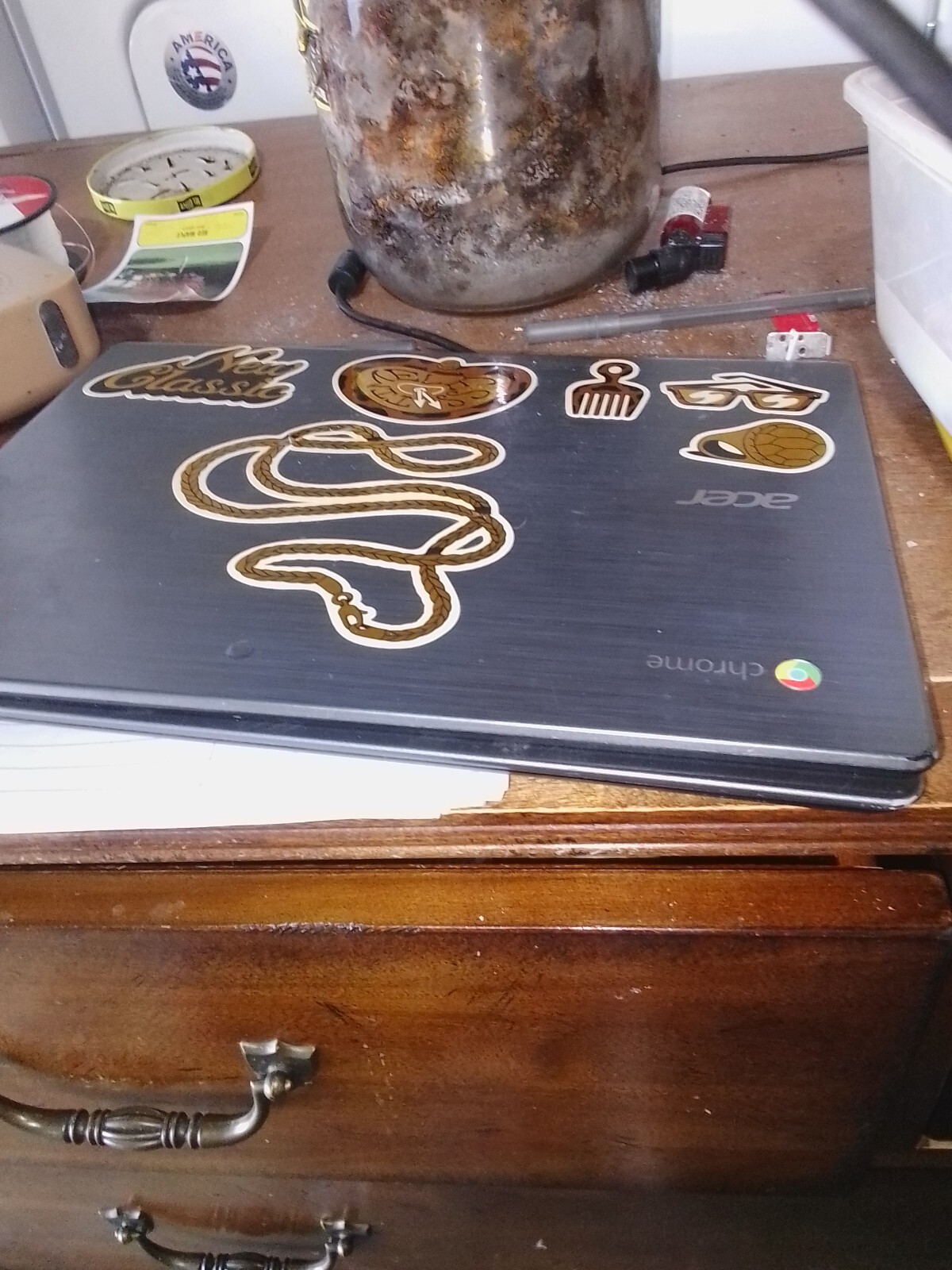 Black bluetoothcrome laptop with charger in the works perfectly