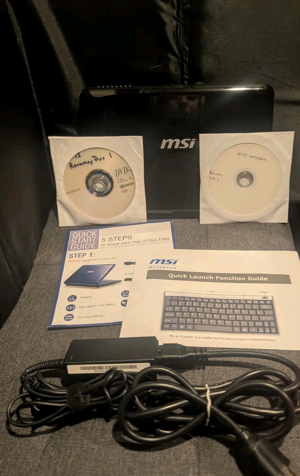 MSI L1350 N014 Intel Atom N455 10″ Laptop W/ Bag, Disks, Booklets & Charger Cord