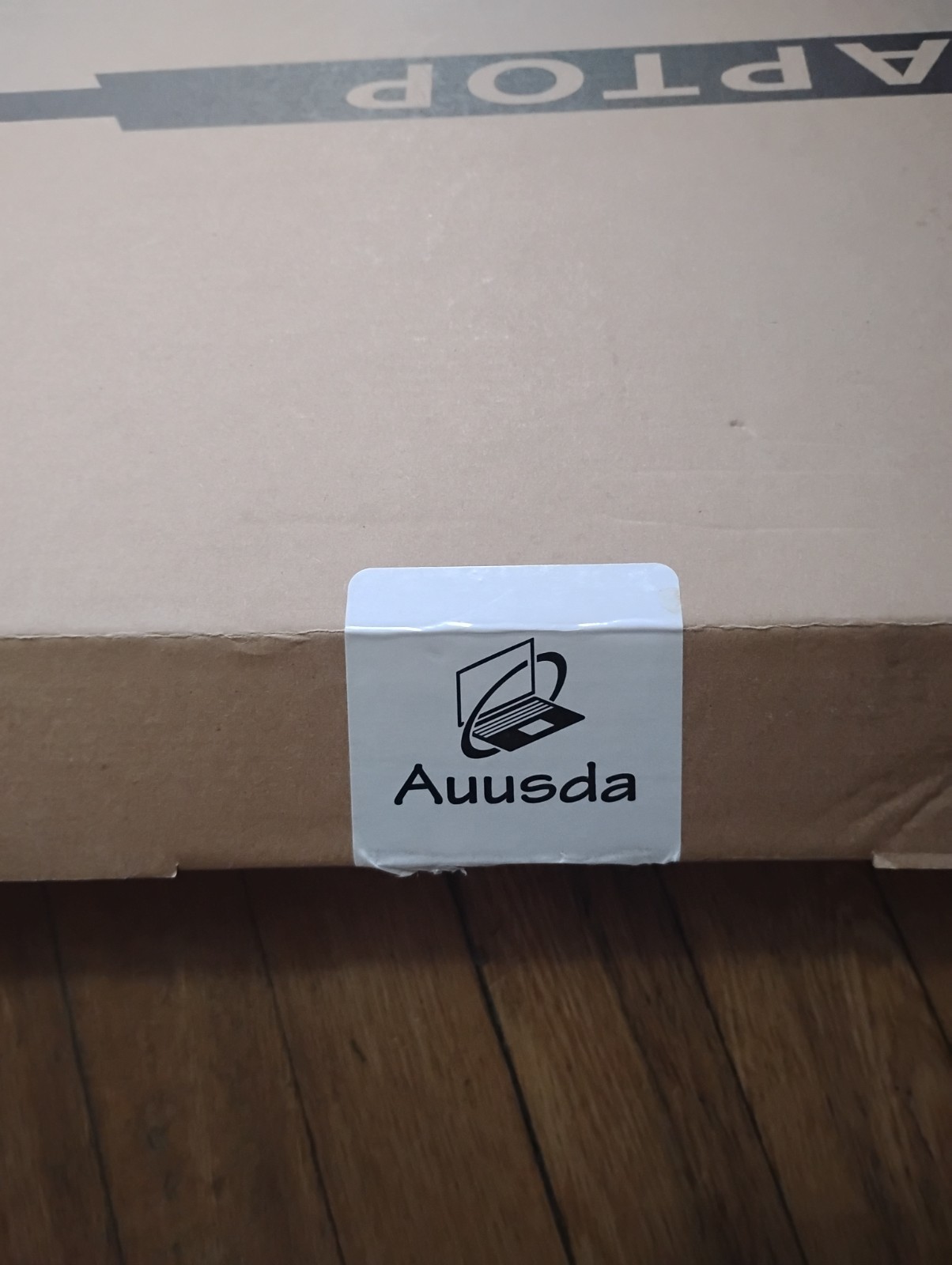 Silver Aussda 14.1″ laptop. NEW. Windows 11. 512 GB, Celeron. LCD screen