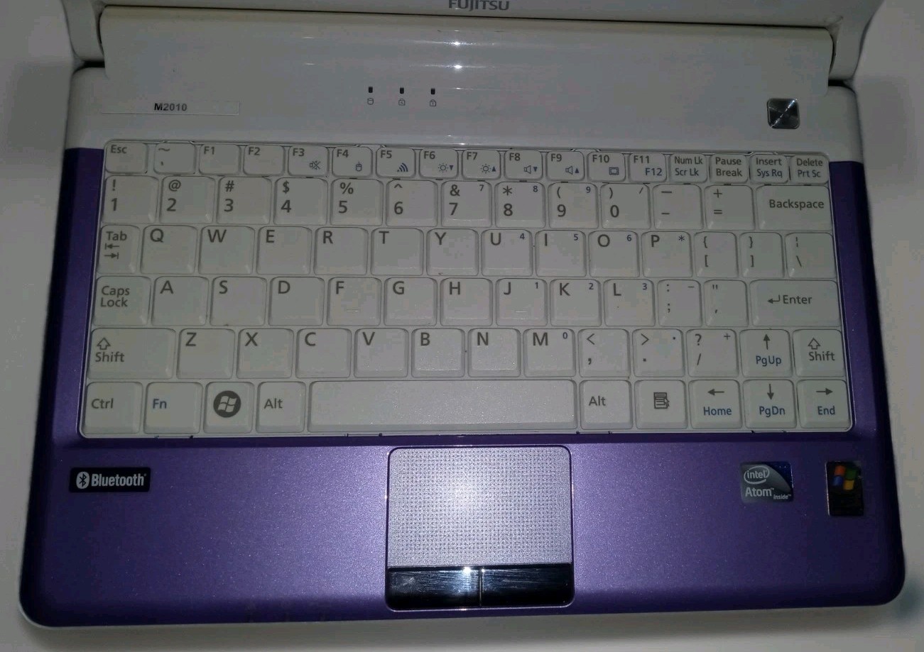 Fujitsu M2010 Series Purple Windows 7 Starter Netbook Laptop Computer