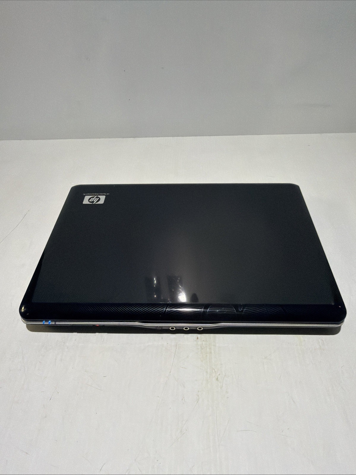 Hp Pavilion dv2700 14″ Laptop AMD Turion 64 X2 2gb Ram NO Drives Boots Bios