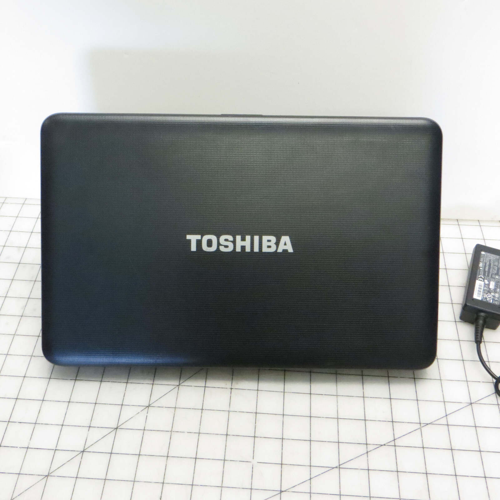 As-is Toshiba C855D AMD E-300 4GB 300GB HDD Windows 10 Laptop – Read for issues