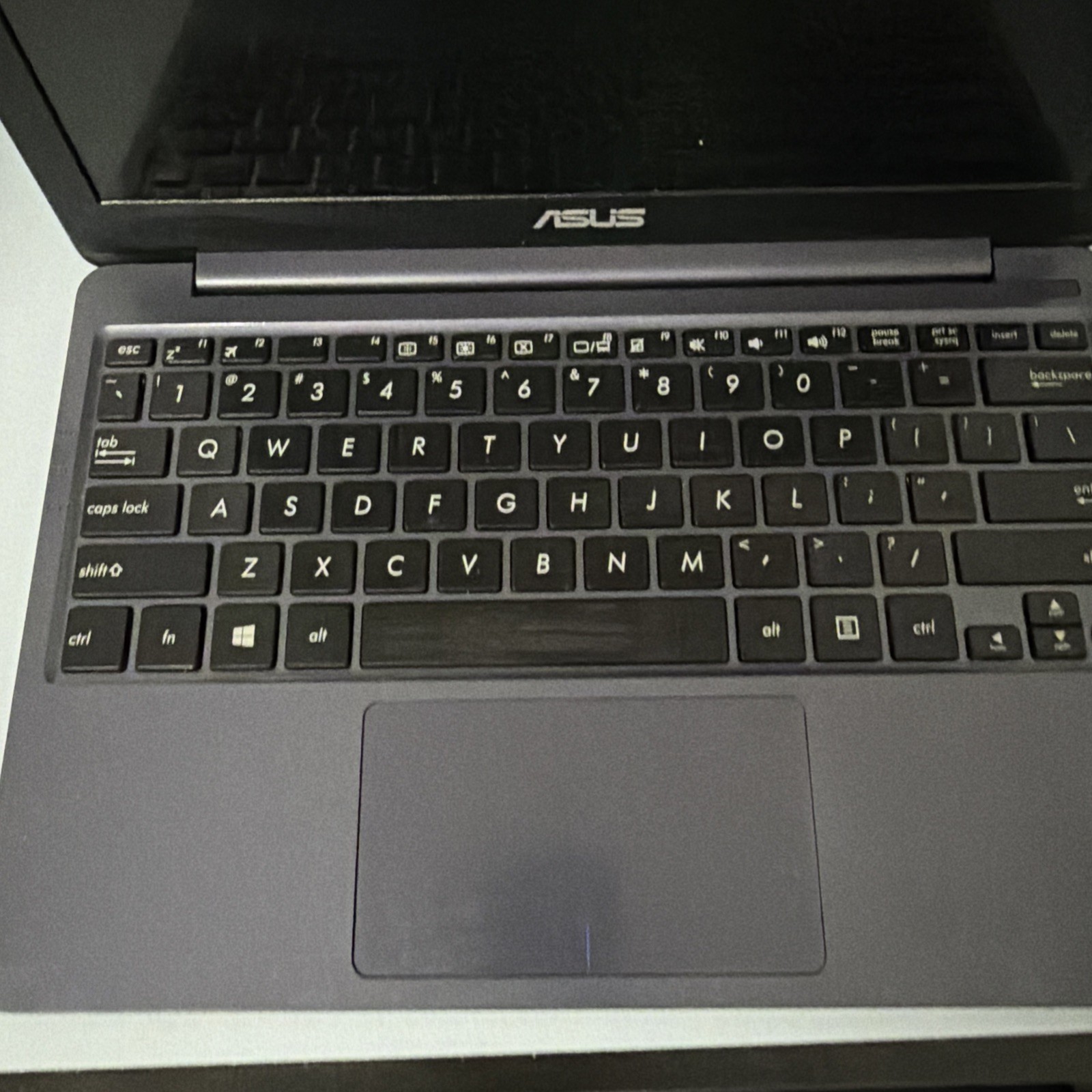 ASUS E203M Laptop, unkown condition needs charger never checked!