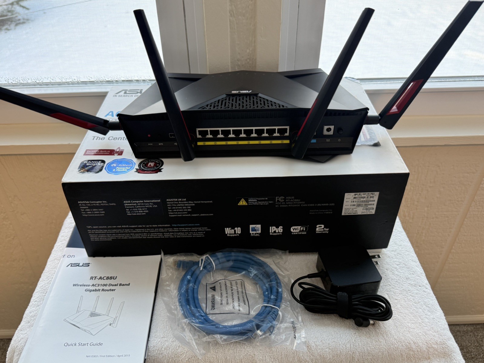 Asus RT-AC 88U WiFi Router/ Asus RP-AC 1900 WiFi Range Expander/ Motorola Modem