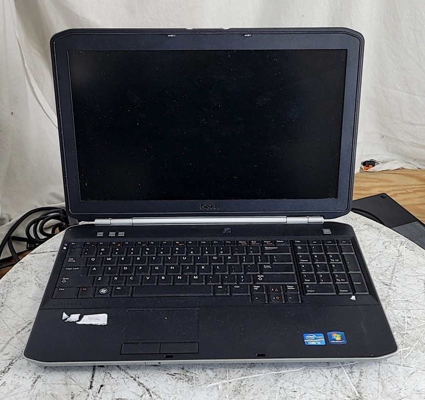 DELL LATITUDE E5520 Laptop Core I5-2520M 4GB 1TB SEE NOTES