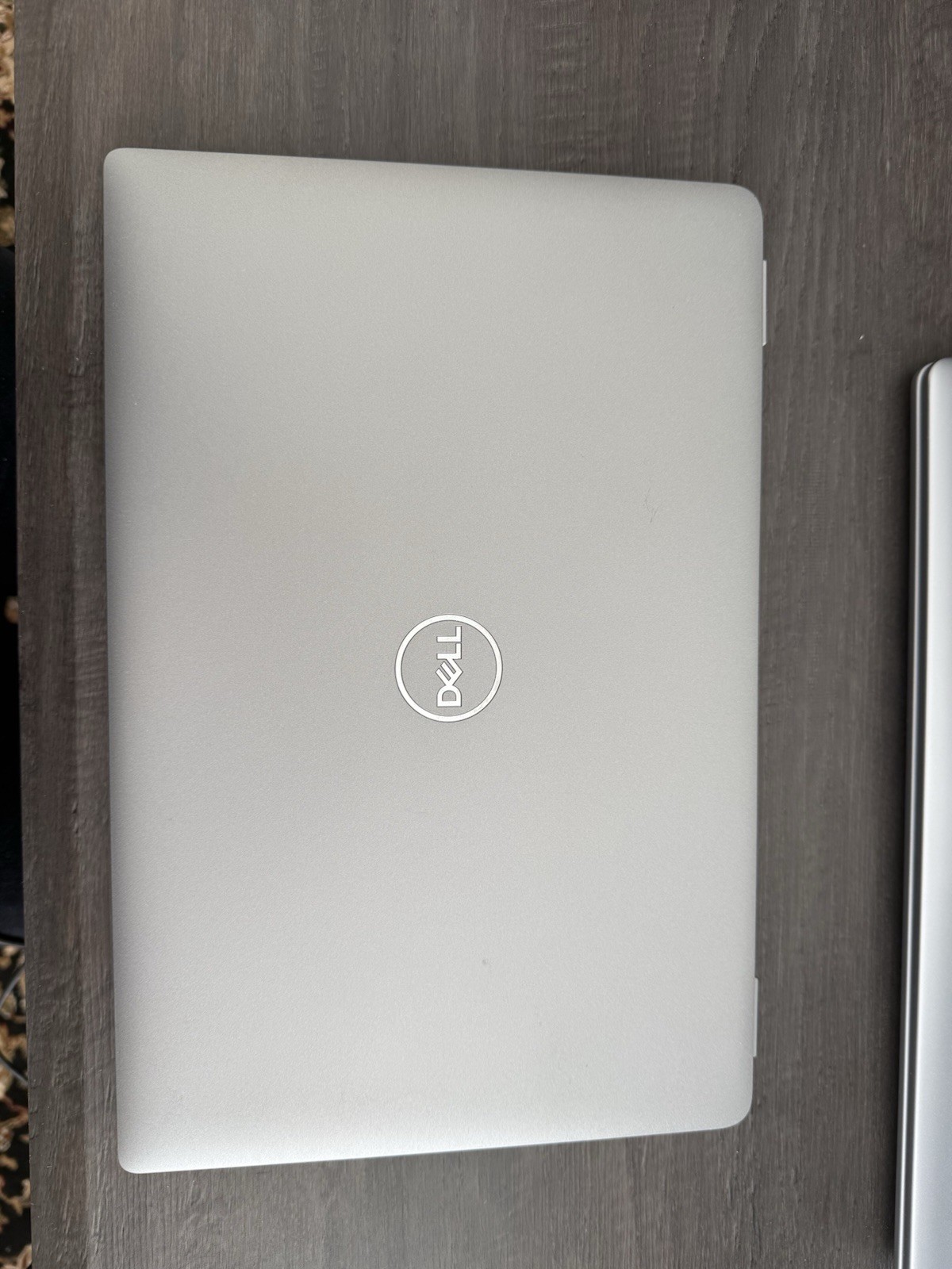 Dell Latitude 5450 laptop. This is a 14-inch business laptop