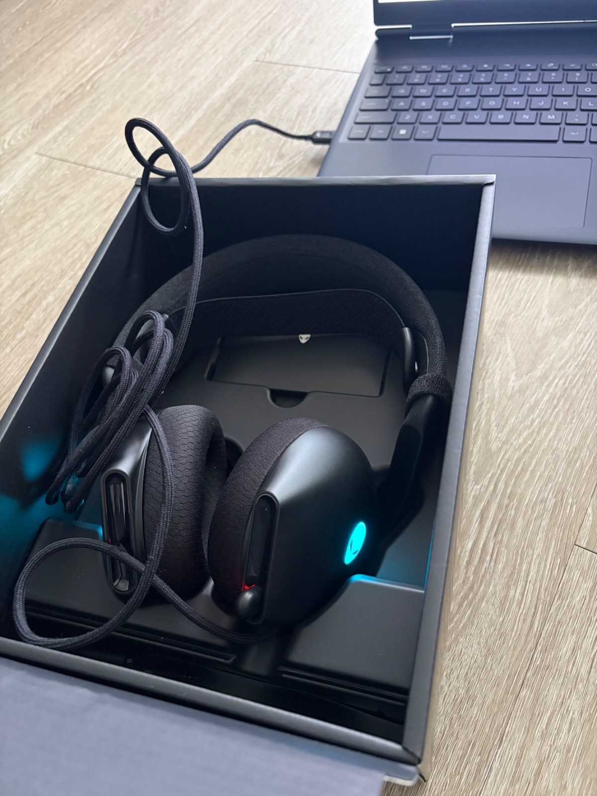 Alienware laptop, gaming monitor, mouse, keyboard, headset and backpack.