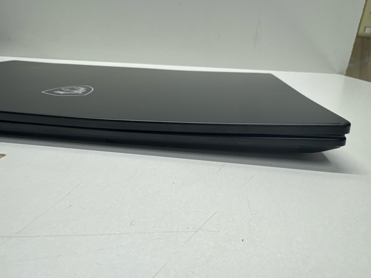 MSI COMPUTER MS-1551 WITH CHARGER (P05025054)