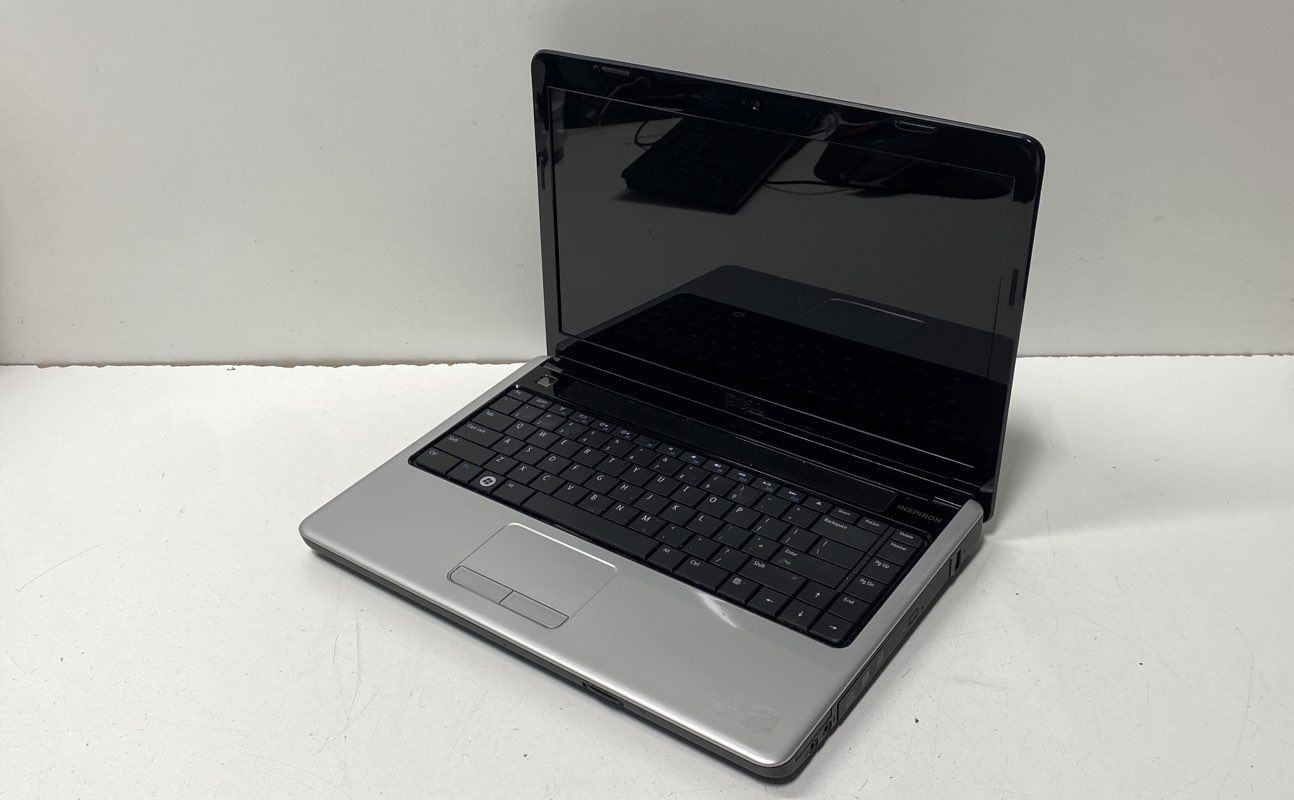 Dell Inspiron 1440 Laptop Model PP42L No HDD Powers On Service Tag 7L9XKJ1