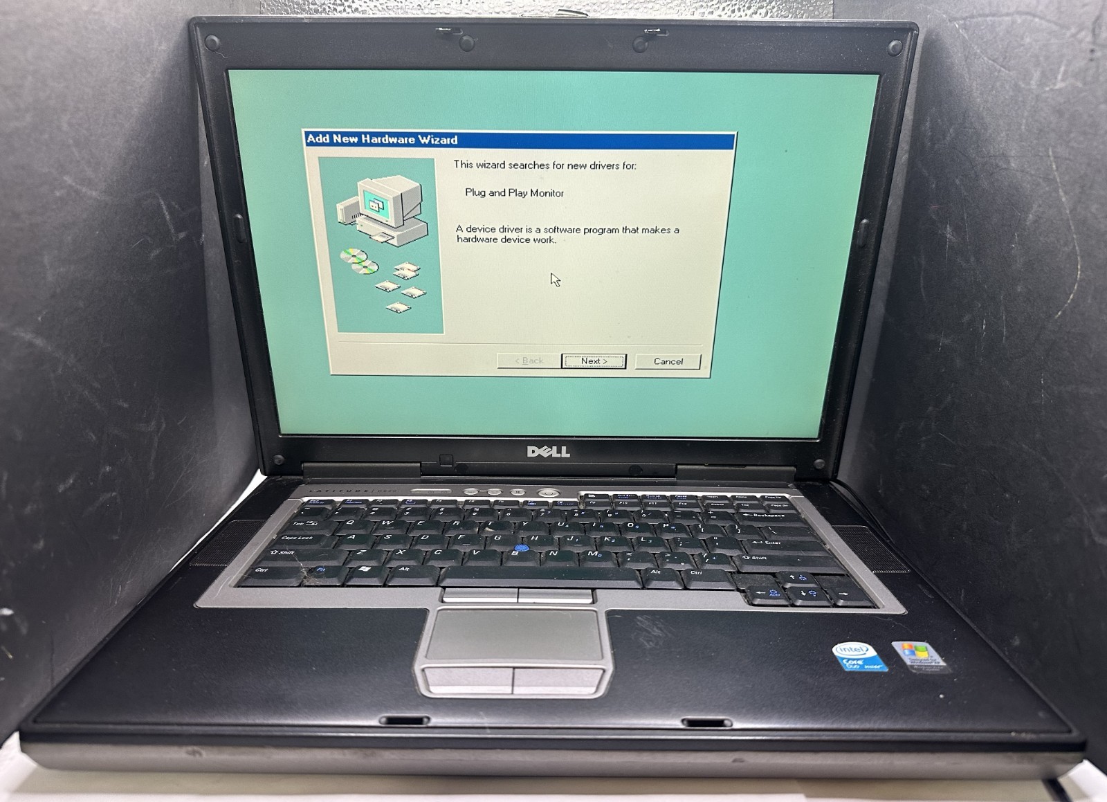 DELL D820 CORE 2 DUO, WIN 98, 64 GB SSD POWER ADAPTER, STRICTLY FOR PARTS/REPAIR