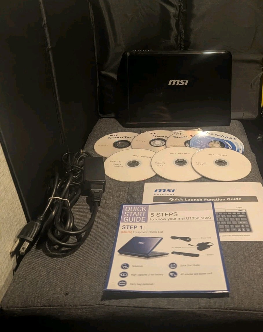MSI L1350 N014 Intel Atom N455 10″ Laptop W/ Bag, Disks, Booklets & Charger Cord