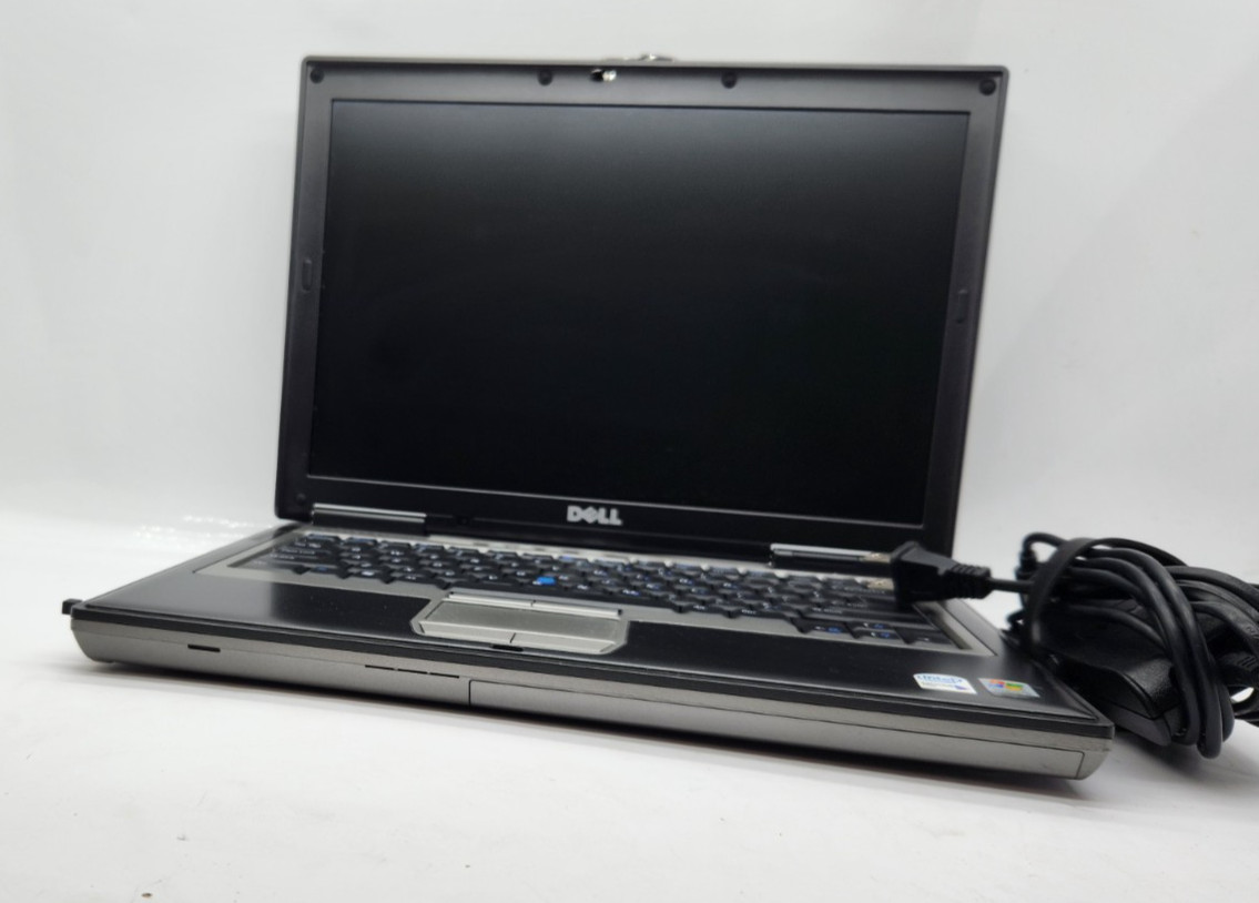 Dell D620 Laptop T2300 1GB Ram CD burner Dvd-rom 60gb hdd Windows 7 w/ Charger