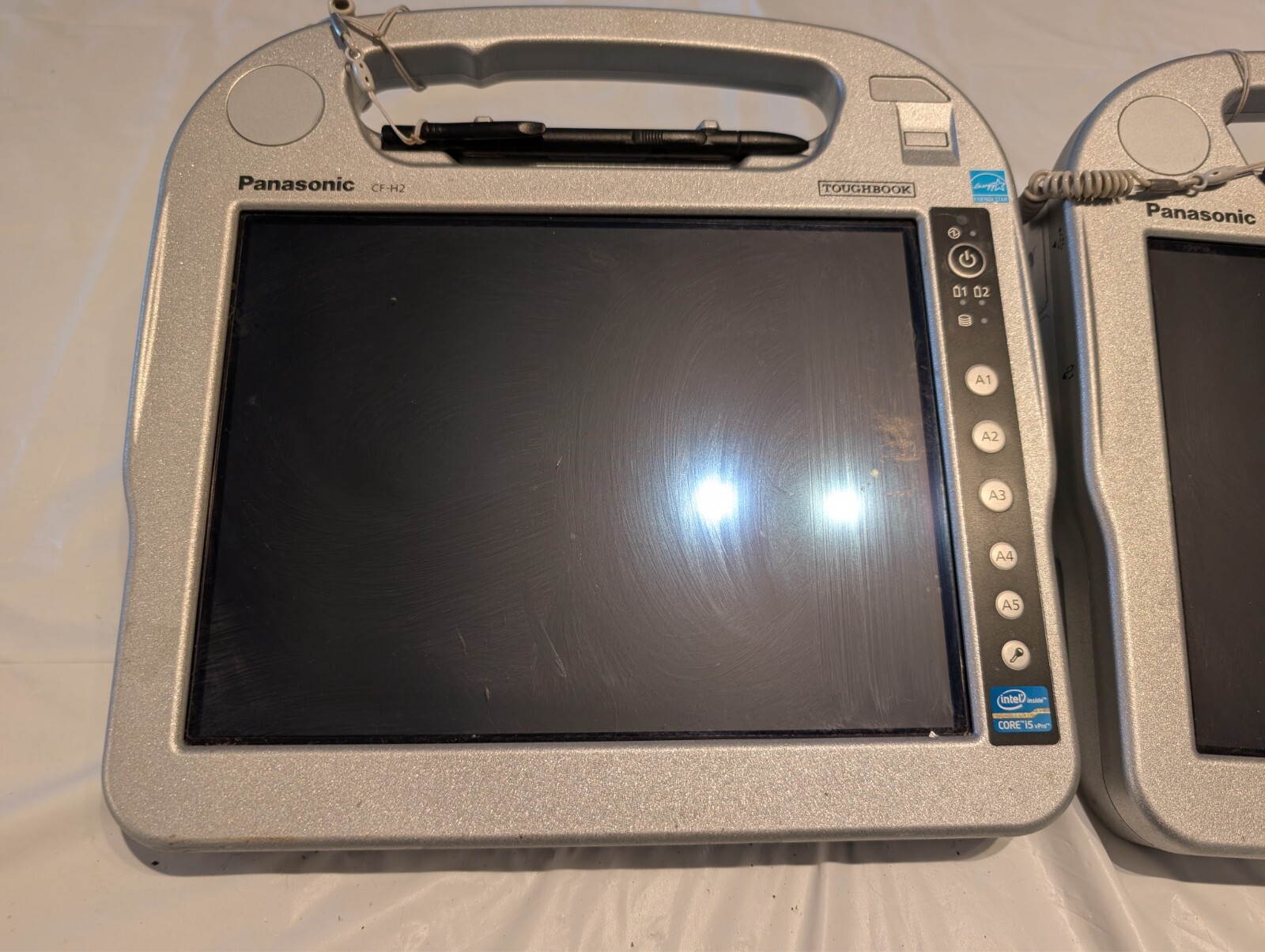 Lot Of 2 Panasonic CF-H2 With 1 Charger Stand ,Working (See Description)