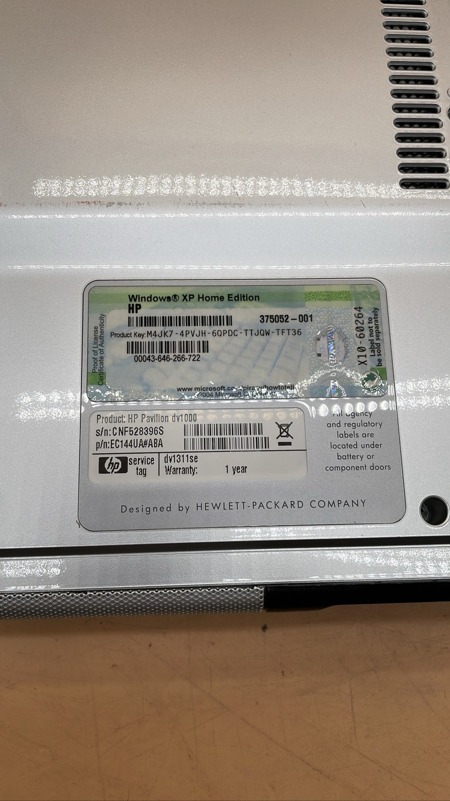 HP Pavilion dv1000 14.1-Inch Intel Celeron M Laptop No HDD Unit w/ Power Adapter