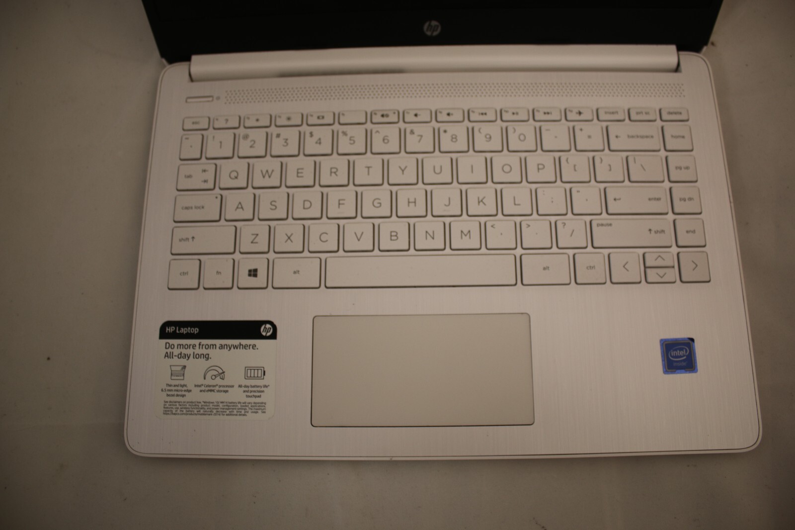 HP Laptop (snowflake) w/ charger (64 gb hard drive, 4 gb ram) 14-DQ0002DX