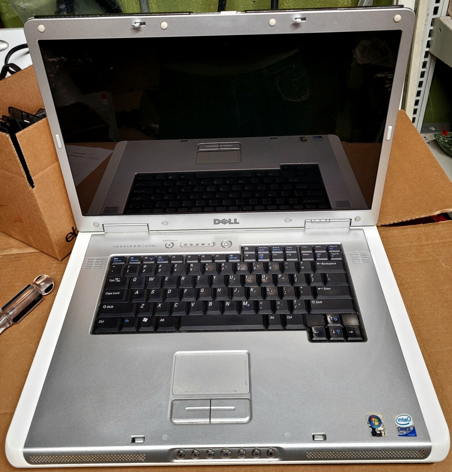 Dell Inspiron E1705 C2D 2.0 Ghz No Ram/HDD/Batt/PS For Parts Only – BAD GPU