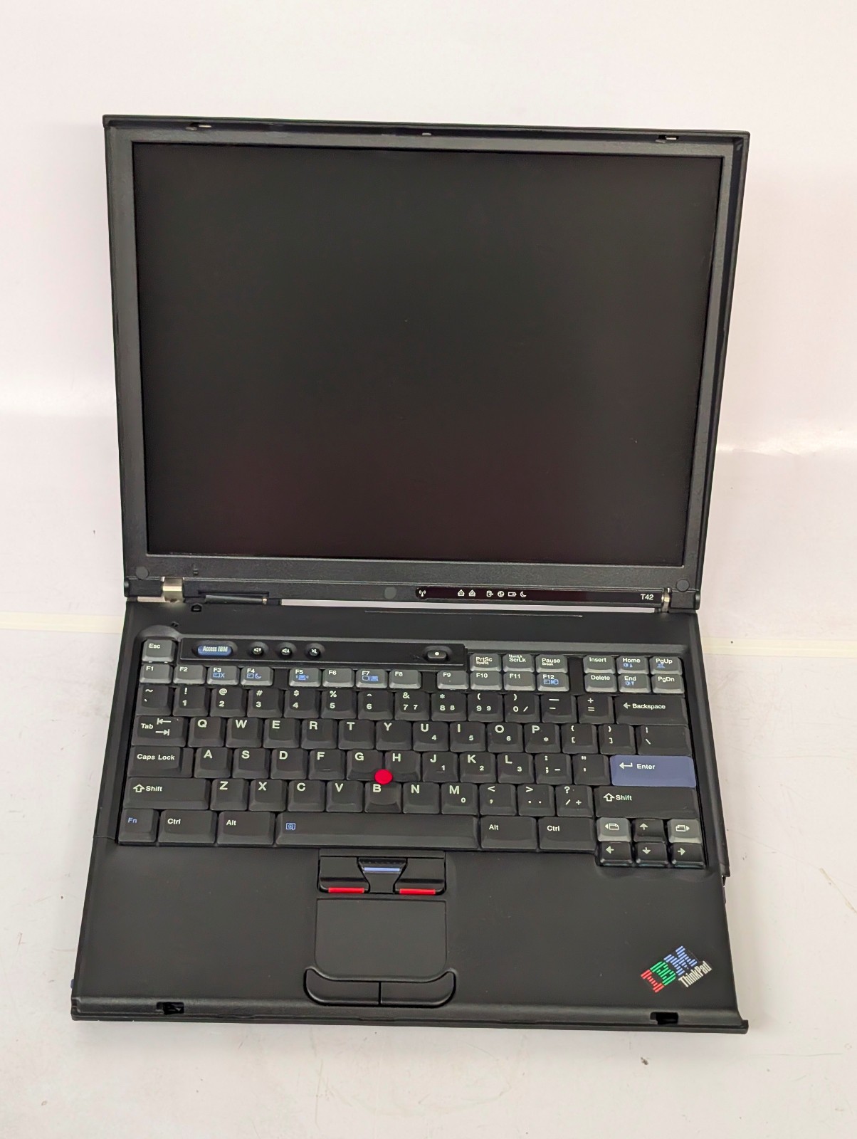 IBM ThinkPad T42 laptop; for parts or repair; 4 beeps 4 times; not powering on